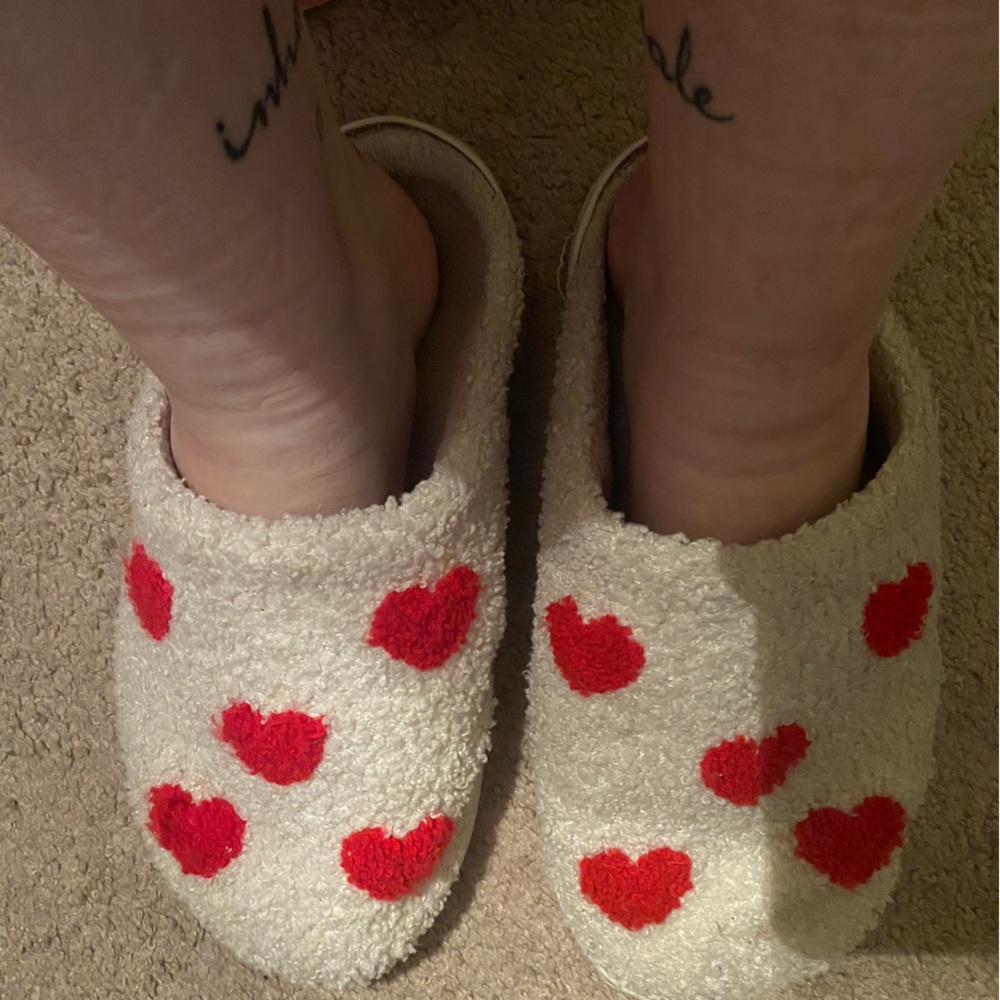 Well loved red heart slippers